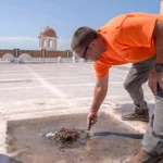 cleaning a roof drain